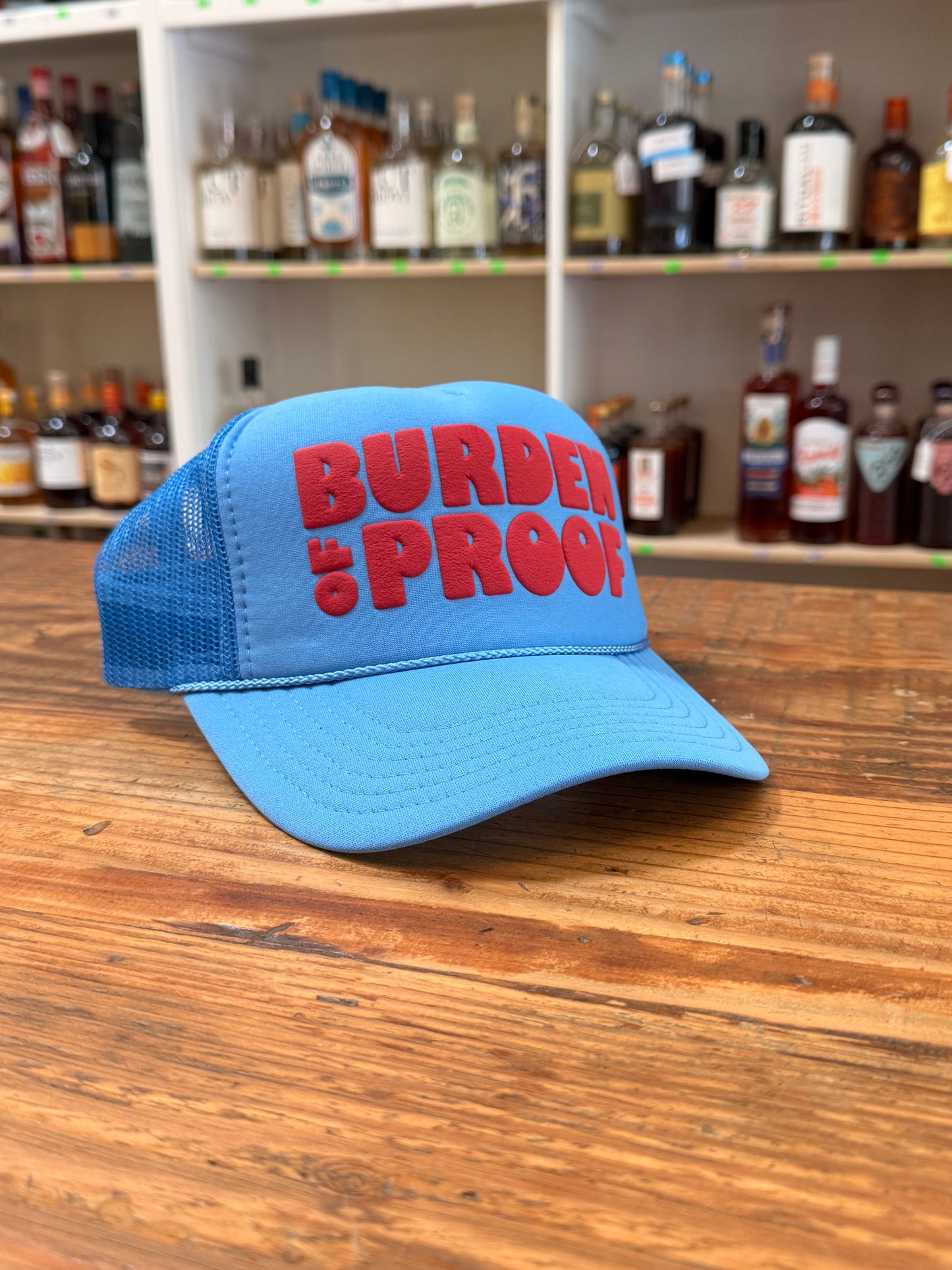 Burden of Proof Trucker Hat